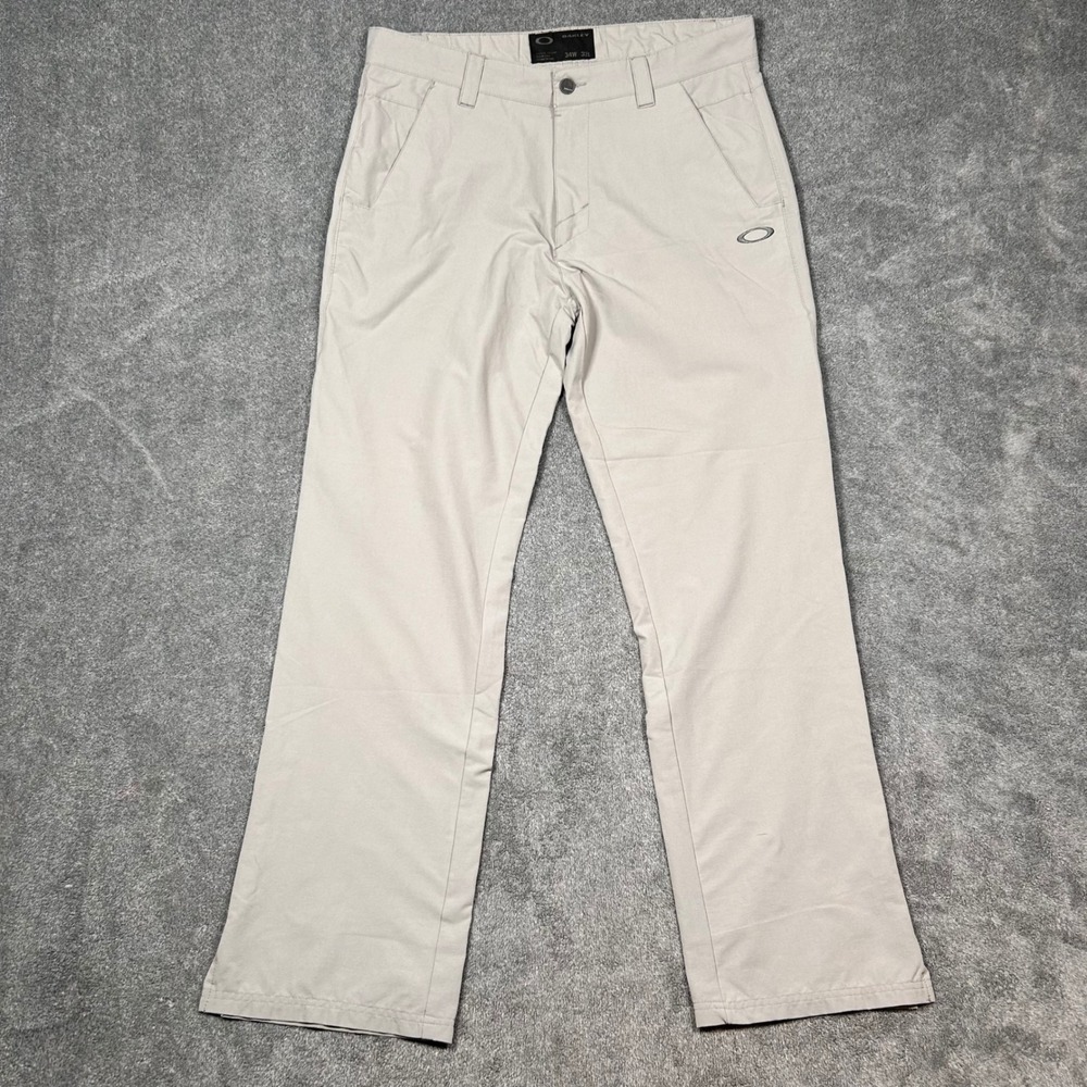 Oakley Mens Golf Pants 34x31 Tan Khaki Flat Front Performance Trousers Split Hem